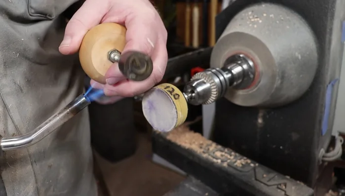 Apply maker's mark using a heated brass rod.