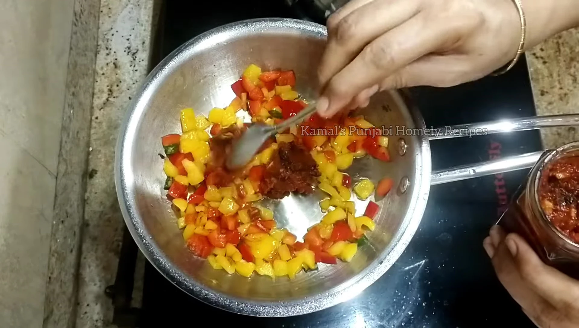 Adding pizza sauce to the gravy.