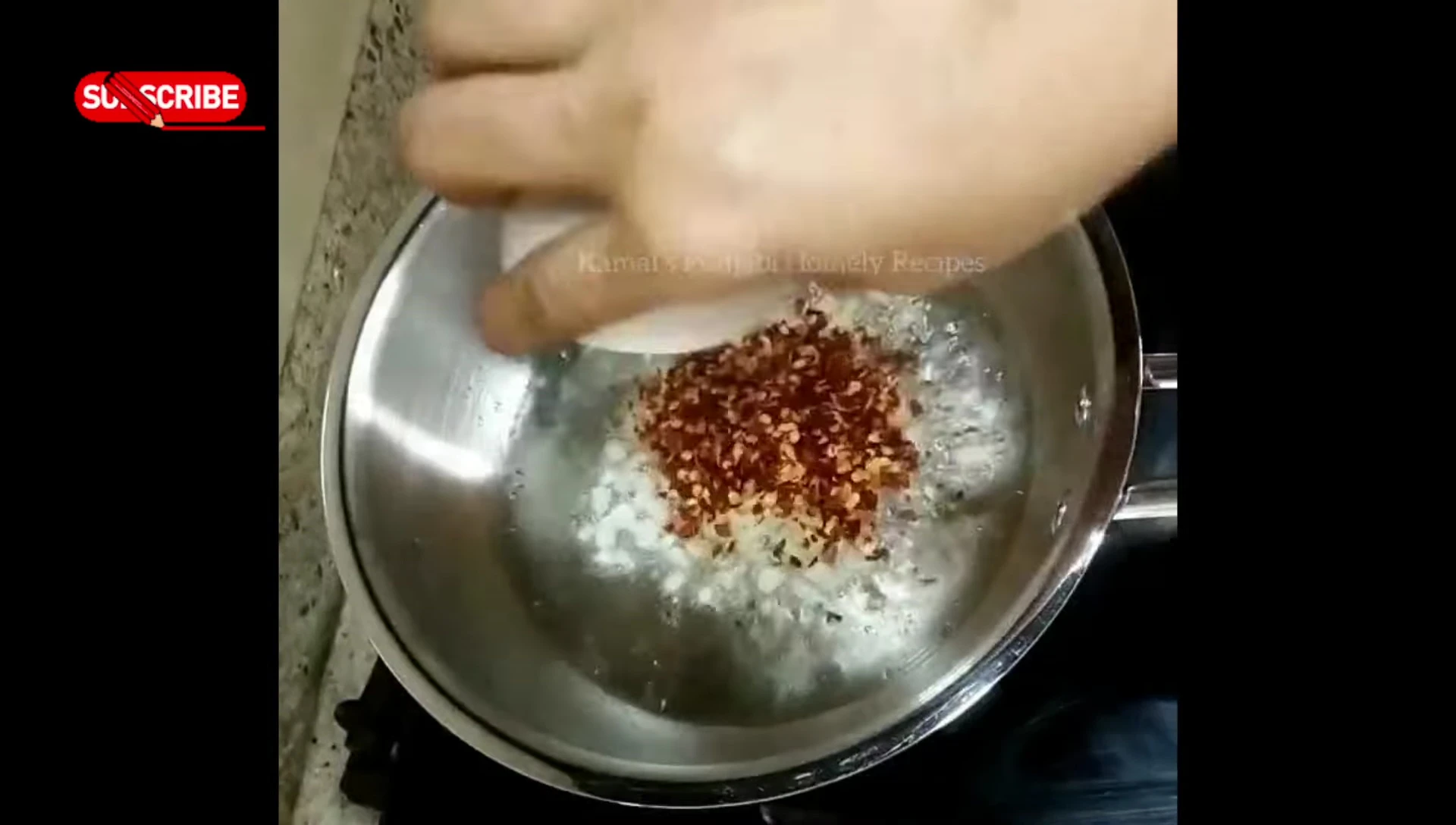 Sautéing garlic and chili flakes.