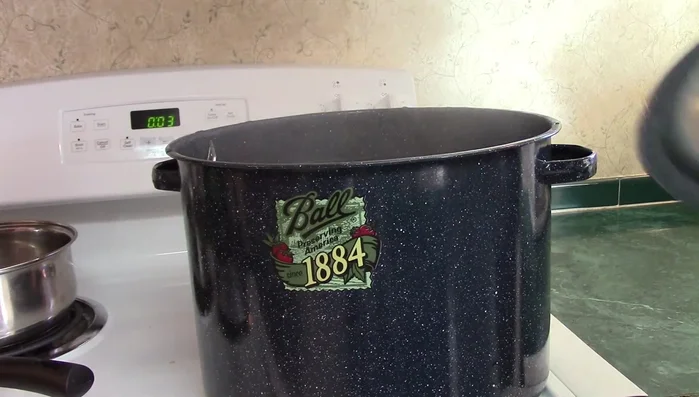 Cool and store: Turn off heat, let the canner sit for 5 minutes, then remove jars and let them cool on a towel. Once cool, remove rings, wash jars, and label with contents and date.