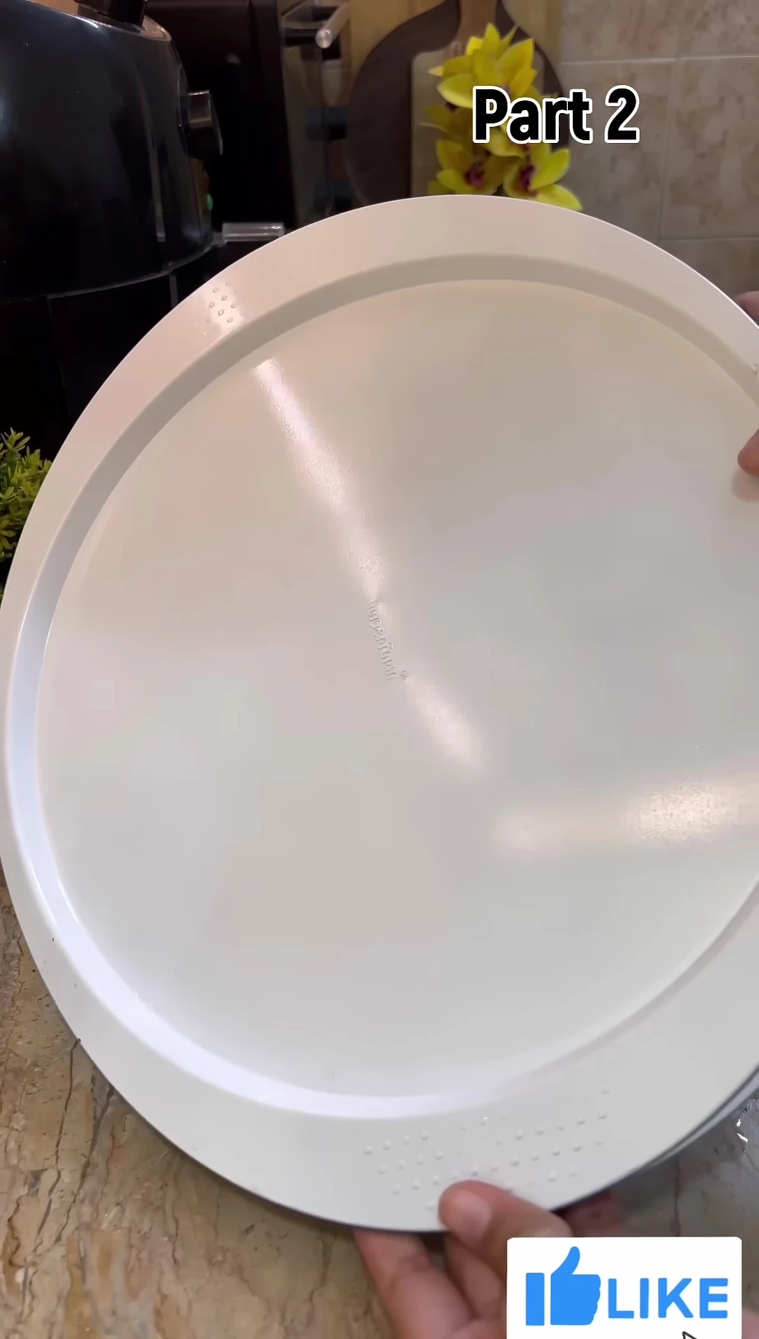 A shot of the new pizza pan, showing its clean, unblemished surface.