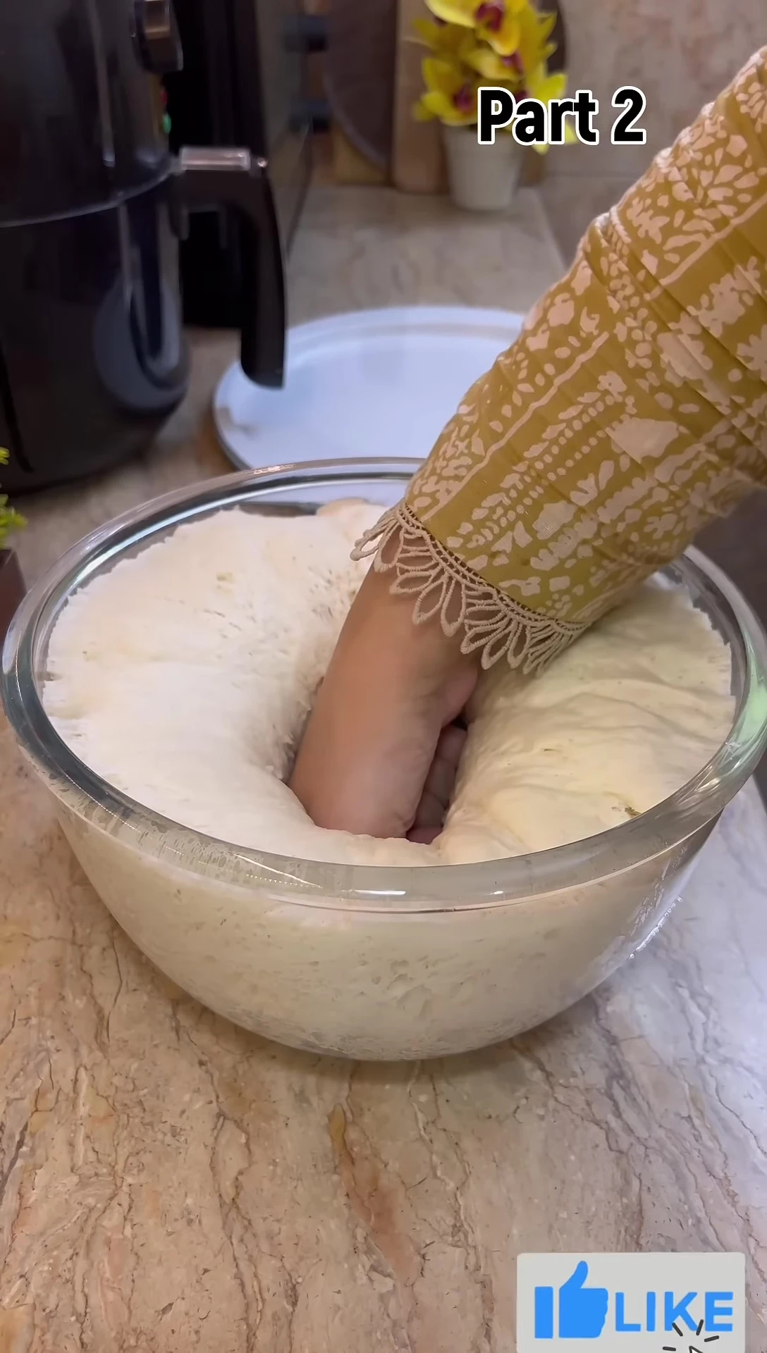 Pizza being easily removed from the pizza pan, demonstrating the non-stick quality.