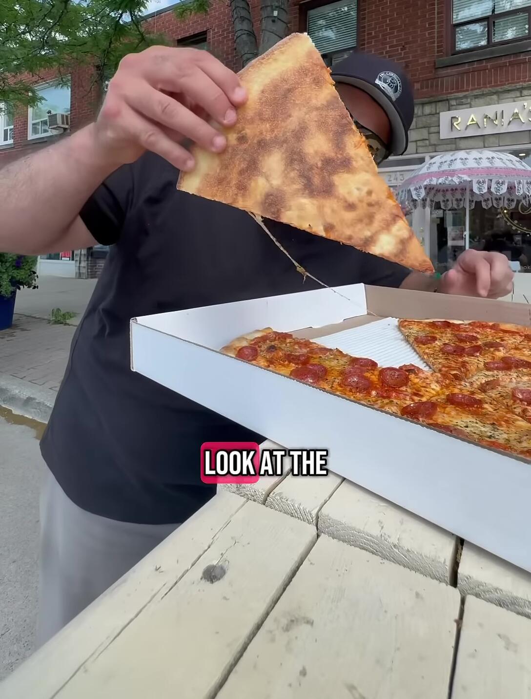 Shot highlighting the underside of the pizza crust