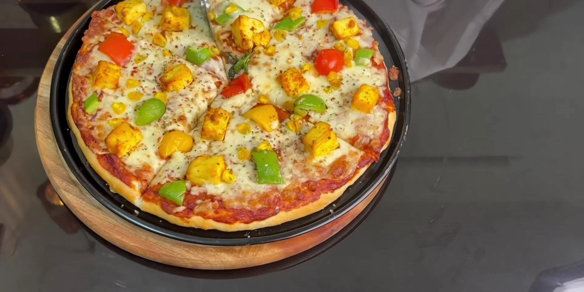 Sliced pizza ready to serve.