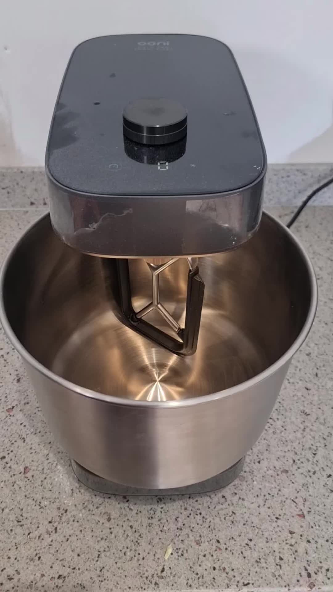 Close-up of the Ooni Halo Pro spiral mixer making noise