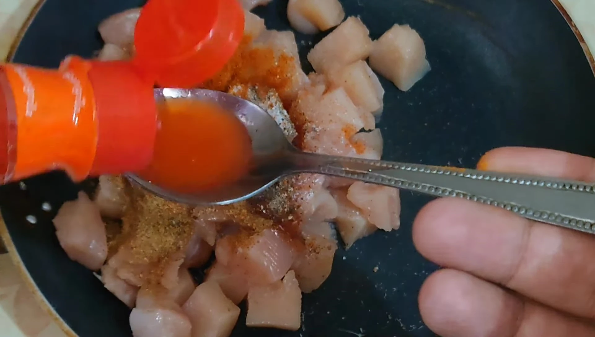 Mixing the chicken marinade