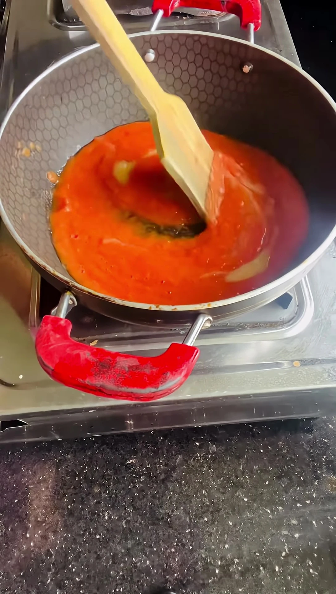 Finished pizza sauce being served