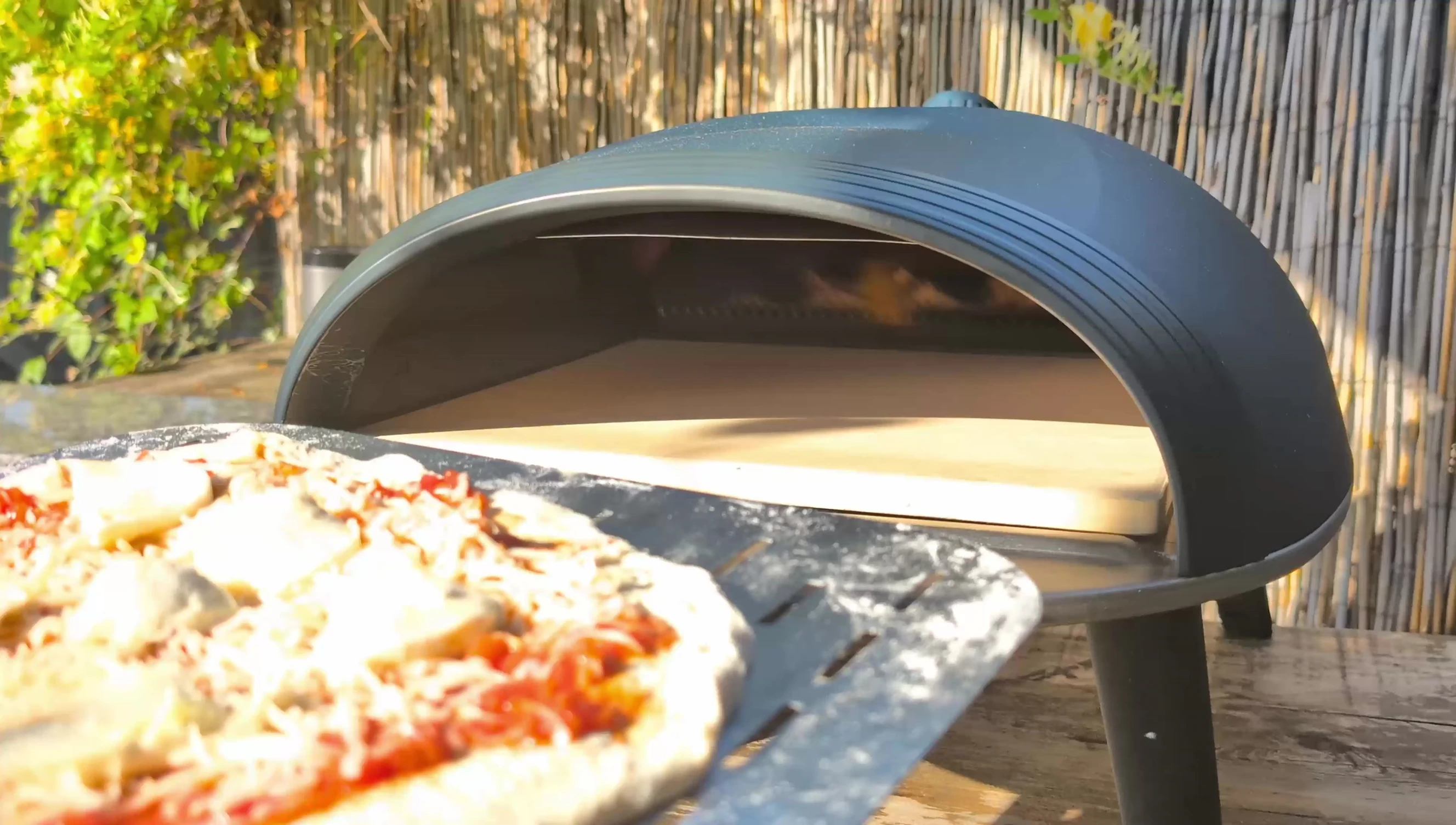 Launching the pizza onto the stone