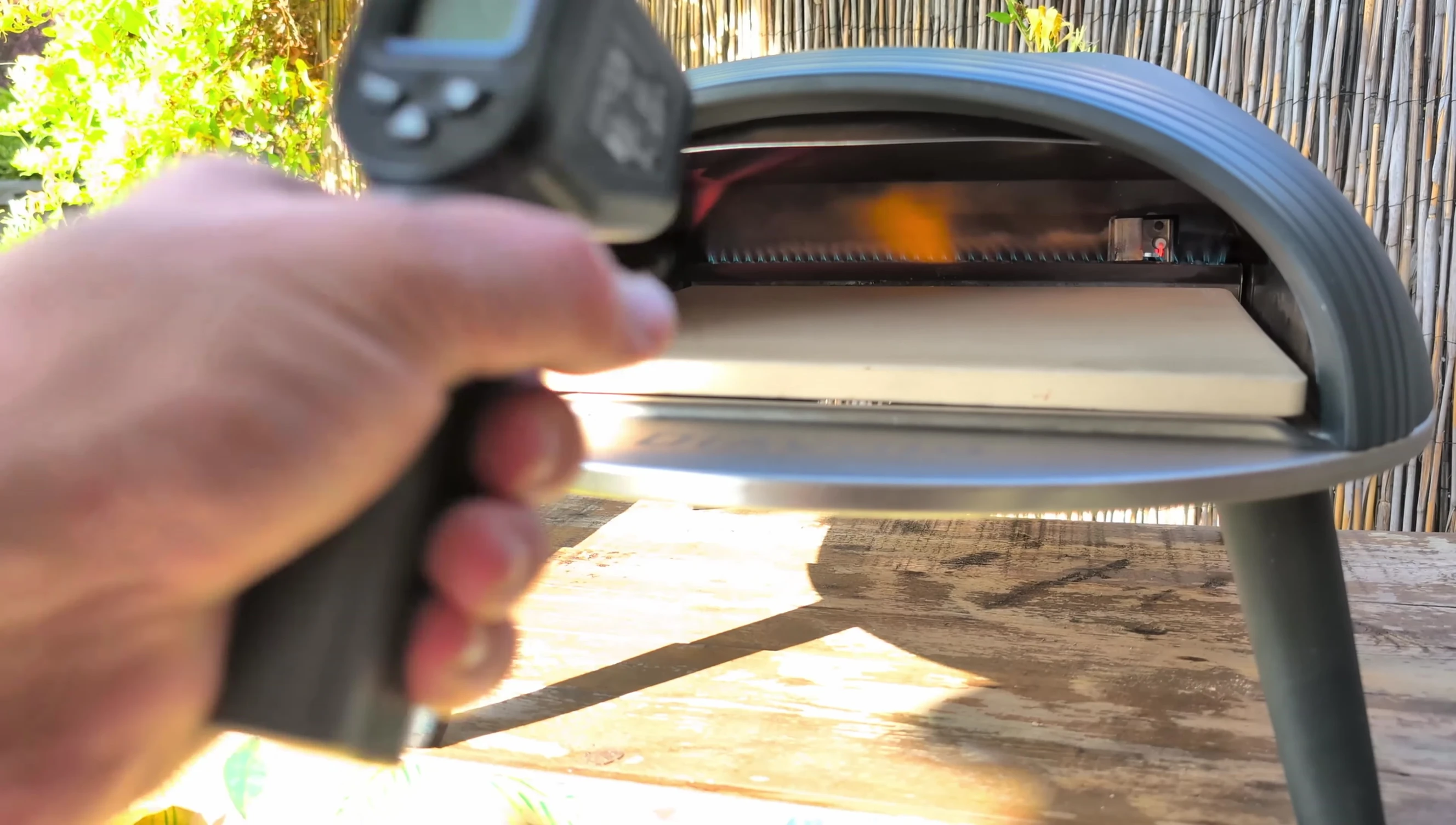 Infrared thermometer reading of the pizza oven stone