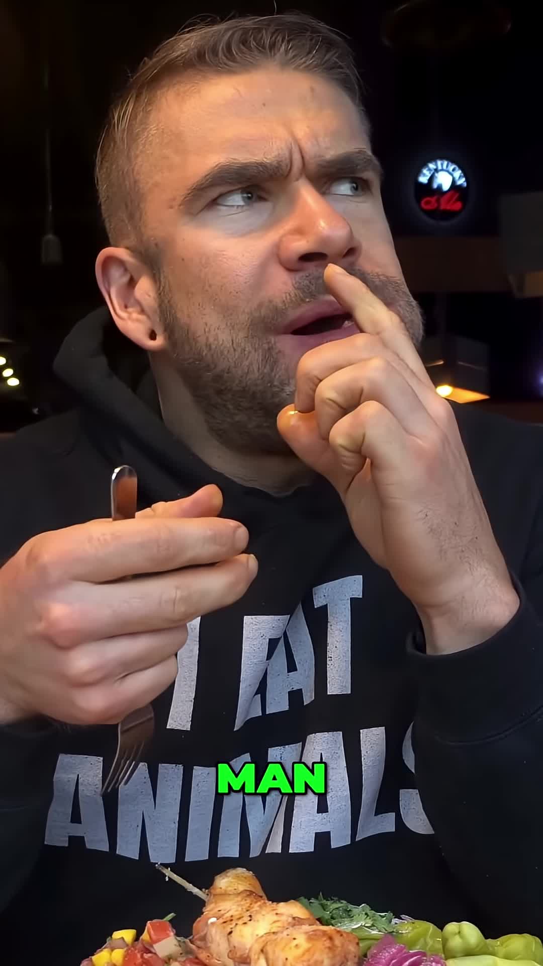 Reaction shot expressing enjoyment of the pickles