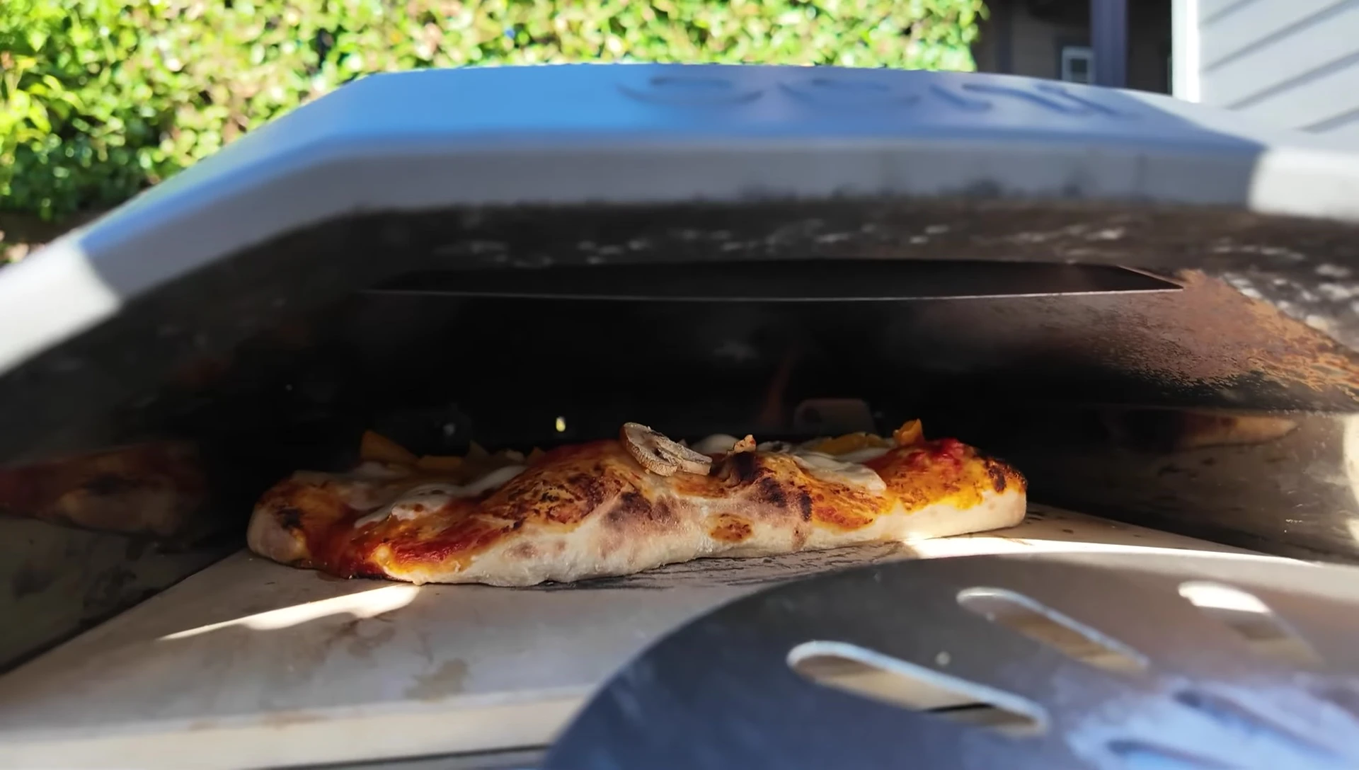 Pizza cooking in the Ooni Koda 12.