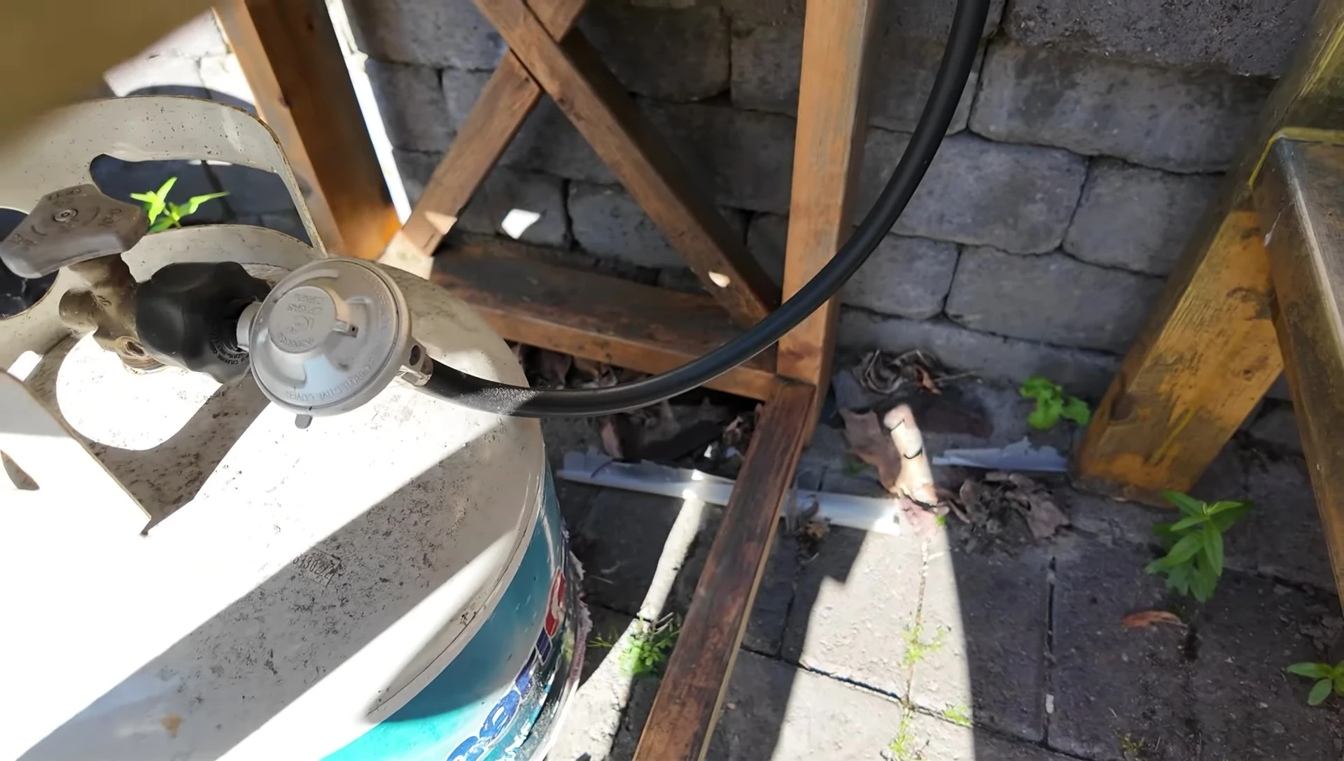 The propane tank connected to the Ooni Koda 12.