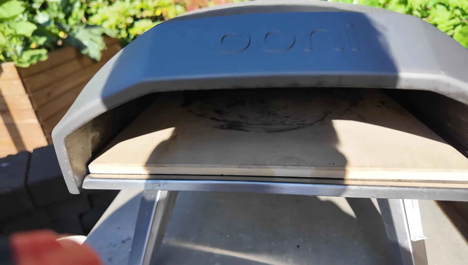 Inside the oven showing the pizza stone.