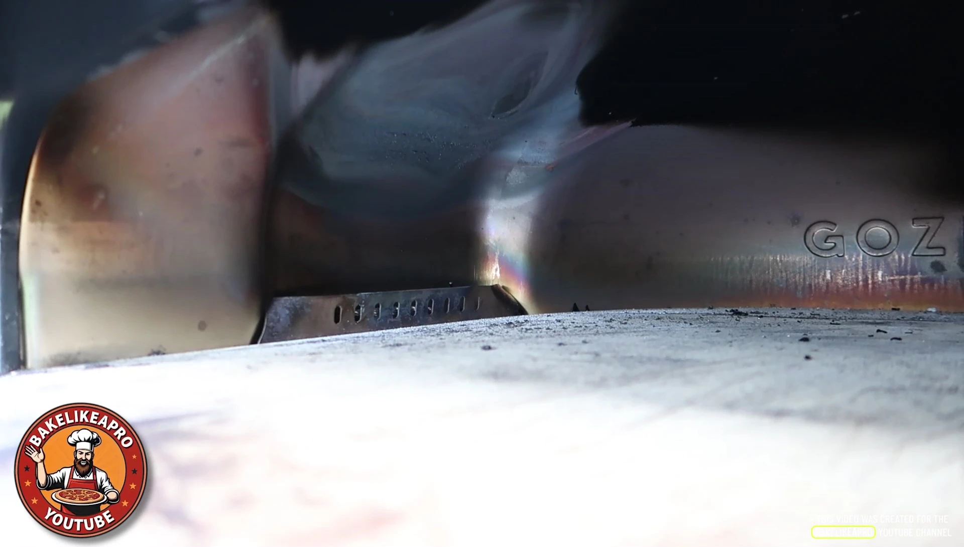 Demonstrating the easy installation process of a flame tamer.