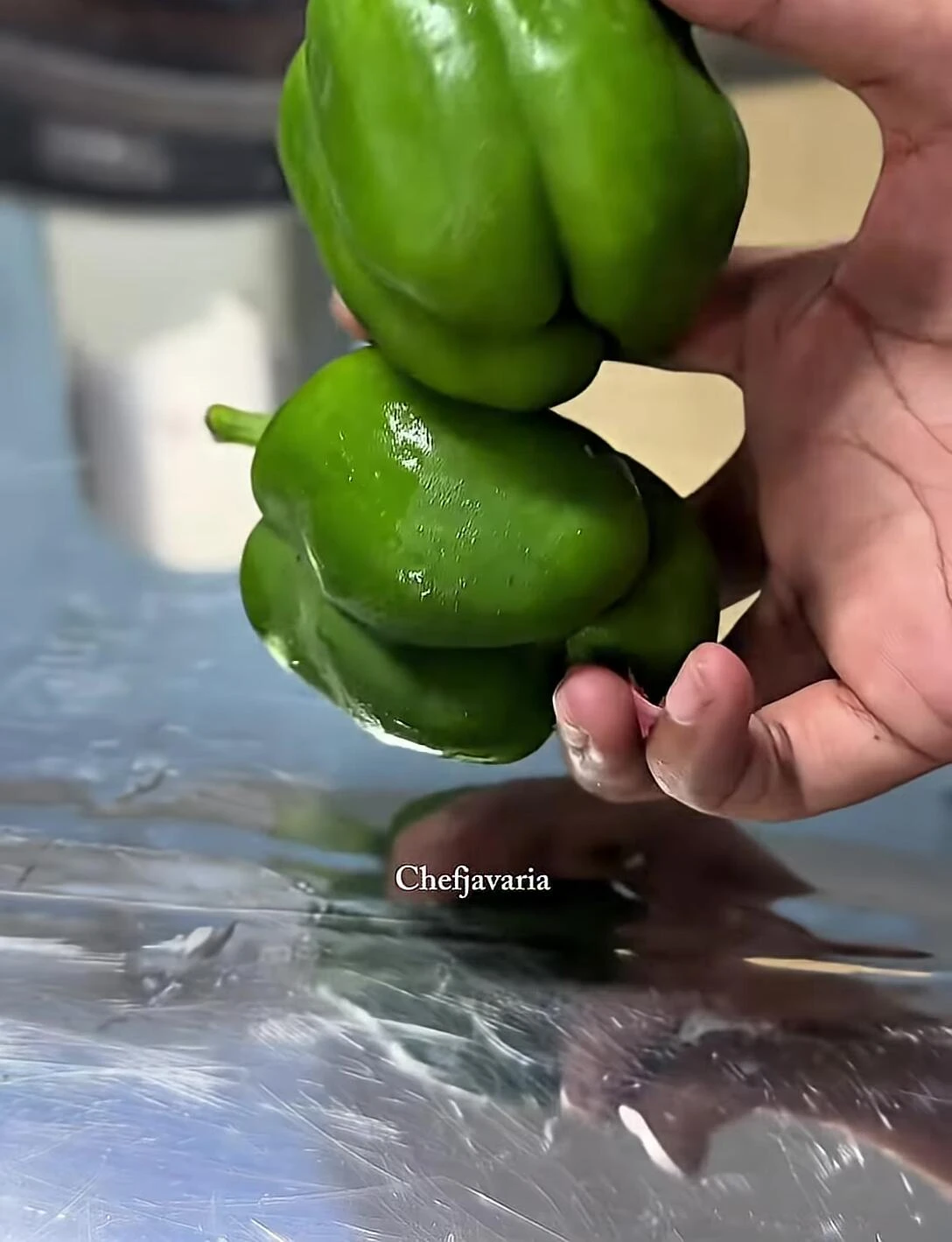 Chopping garlic, onions, and bell peppers.