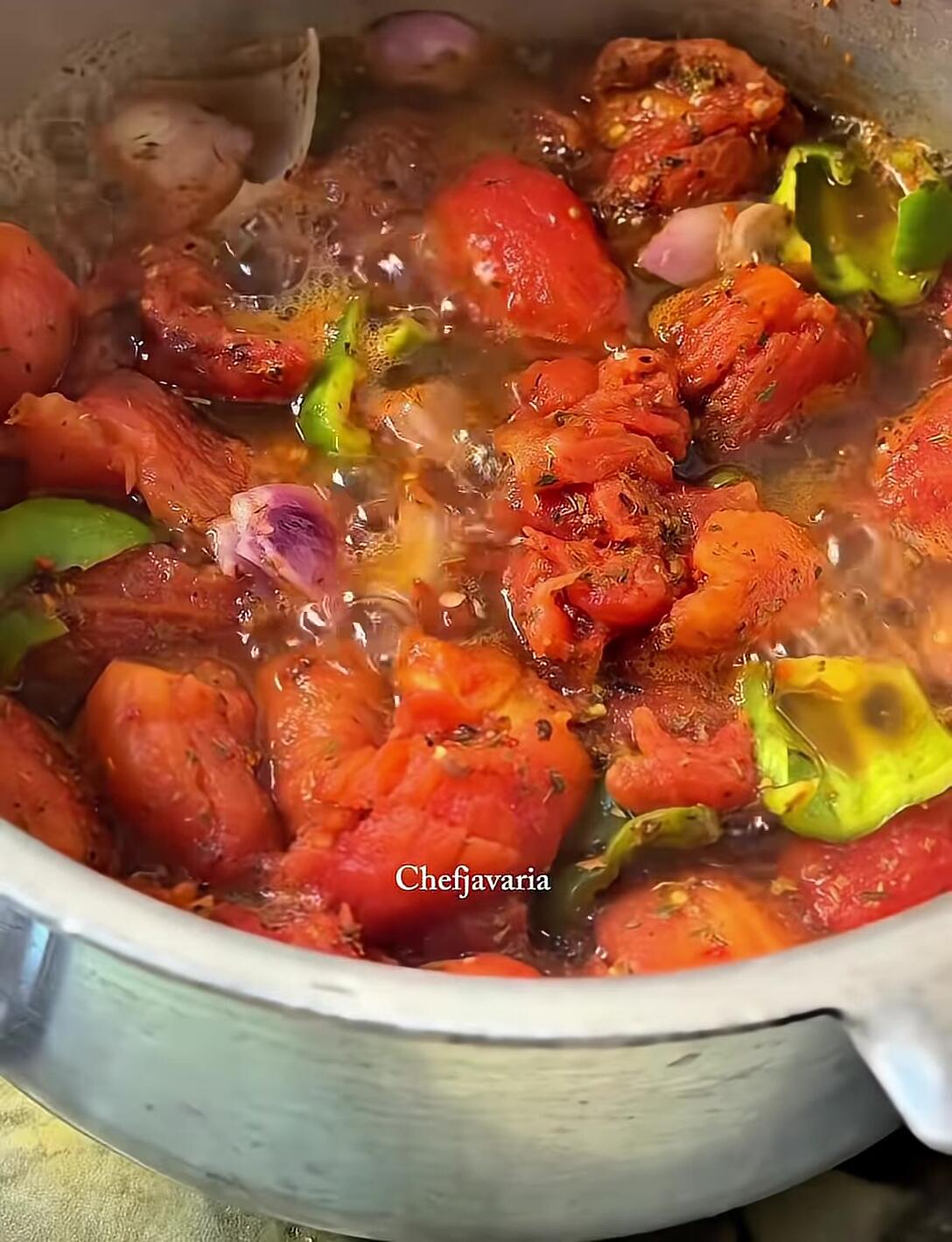Soft tomato mixture after simmering.