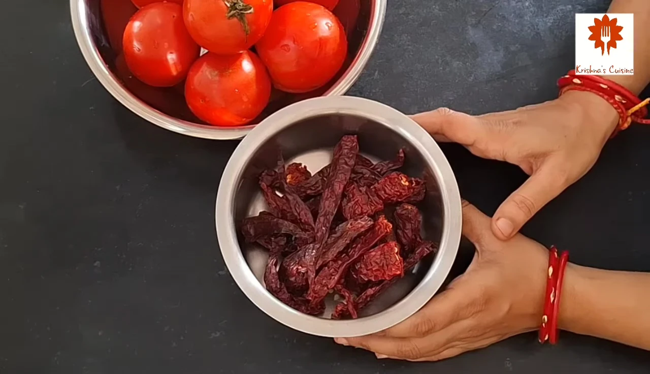Dried Kashmiri red chilies being soaked in hot water
